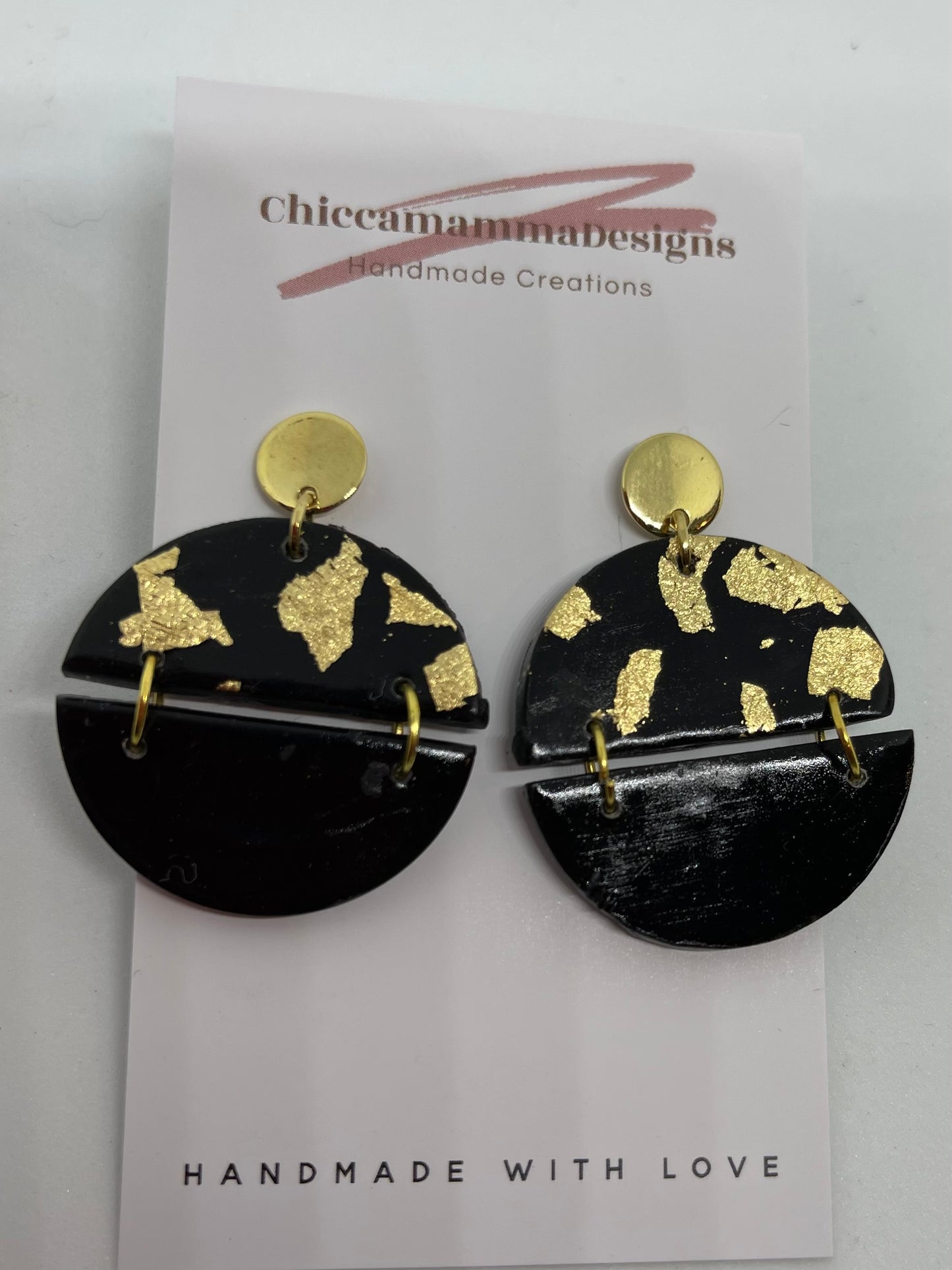 black and gold polymer clay earrings with gold leaf