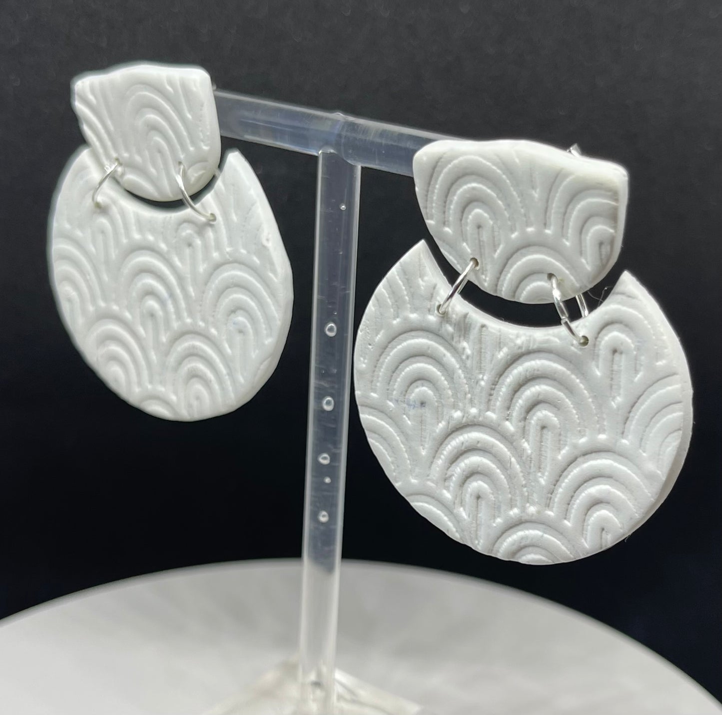 textured white dangle earrings